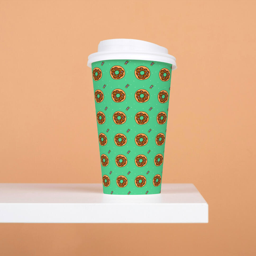 Delicious donut pattern with a cheeky sweet in the corner and dustings of sugar - Yemisi Olusanya