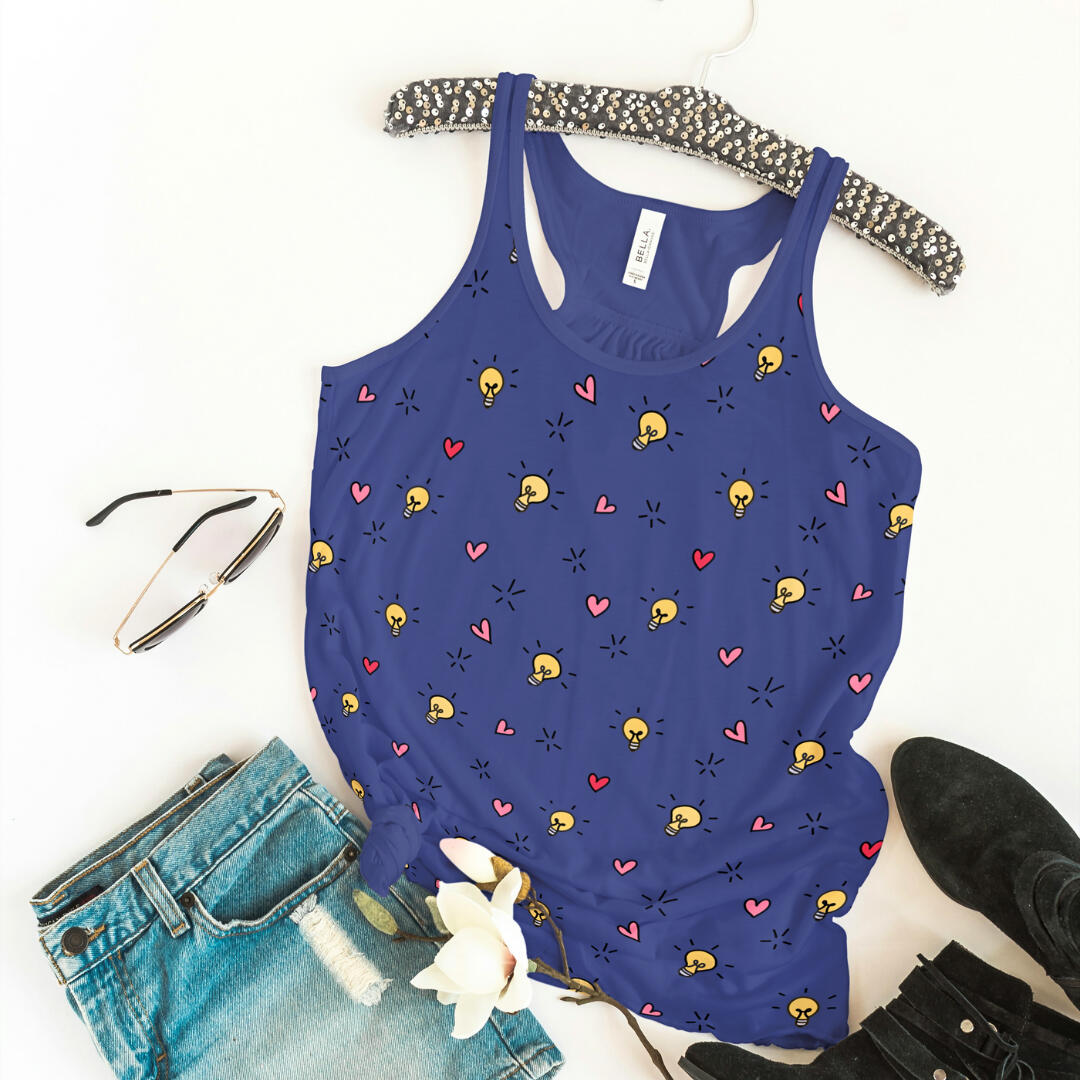 Whimsical, yellow lightbulbs and red and pink heart pattern on a blue background - Yemisi Olusanya